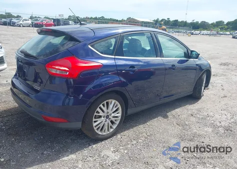 2016 Ford Focus Titanium z USA, uszkodzony, nr VIN 1FADP3N27GL222574